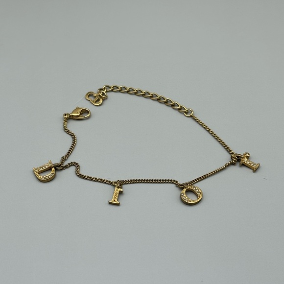 Authentic DIOR Gold tone charm bracelet with box - Picture 2 of 3